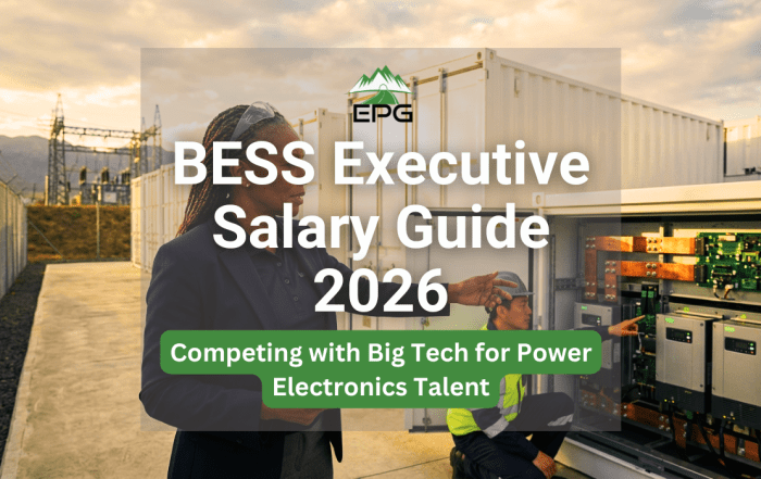 A female technical executive and engineer inspecting power electronics inverters at a utility-scale battery energy storage system (BESS) facility.