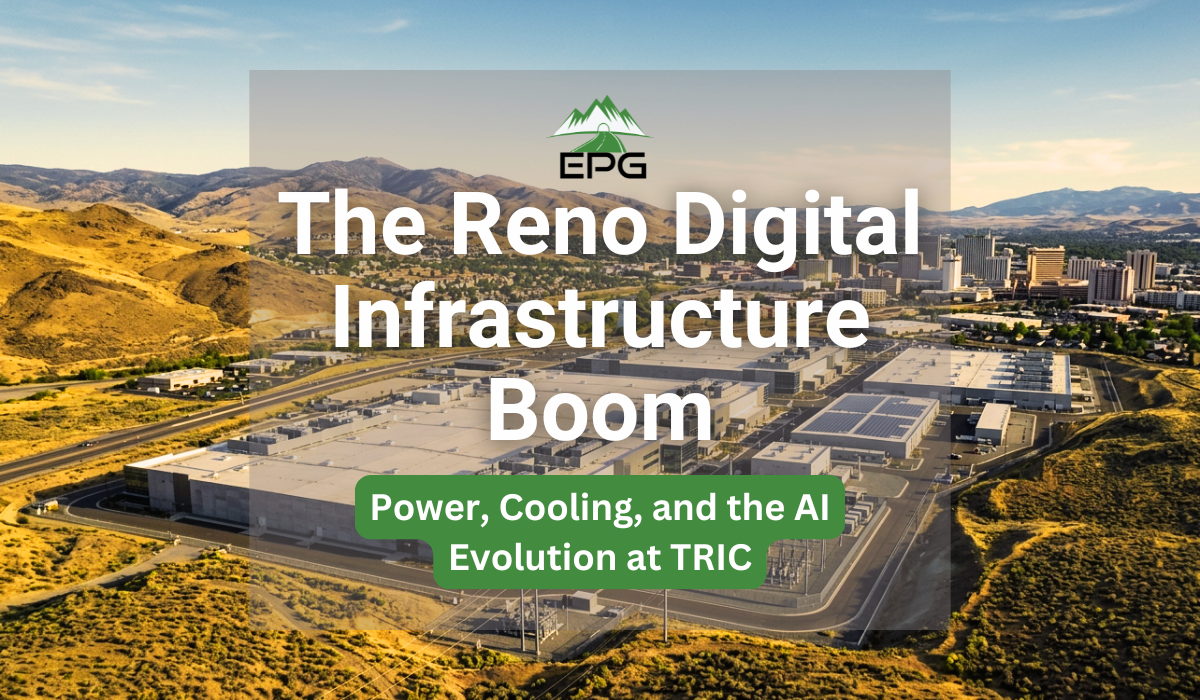 Aerial view of a massive modern data center campus representing the expanding Reno digital infrastructure corridor, with the downtown Reno-Sparks skyline and arid high-desert mountains in the background.