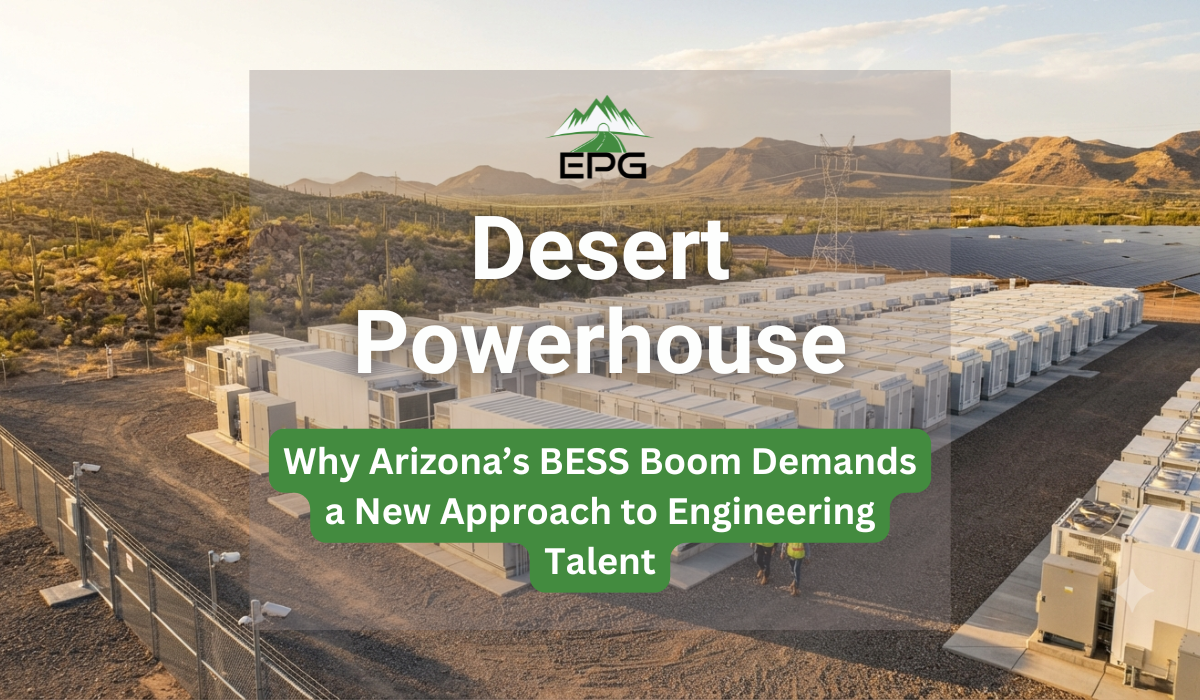 Wide-angle aerial view of a massive utility-scale Battery Energy Storage System (BESS) in the Arizona desert, featuring rows of white battery containers, cooling units, and two engineers walking on-site with saguaro cacti and mountains in the background.